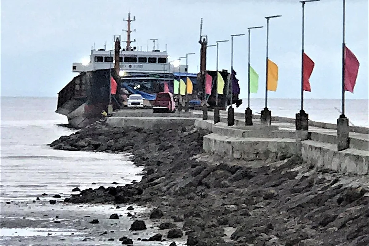 Rural island port pier and maritime transfer facility in Iloilo used for secondary logistics to out-of-delivery provincial areas.